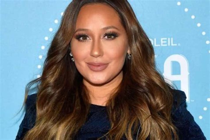 Adrienne Bailon Shares Bathing Suit Photos To Flaunt Dramatic Weight Loss