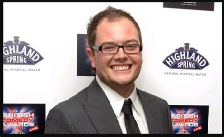 Alan Carr seen shaking Hands with guy companion after Paul Drayton split