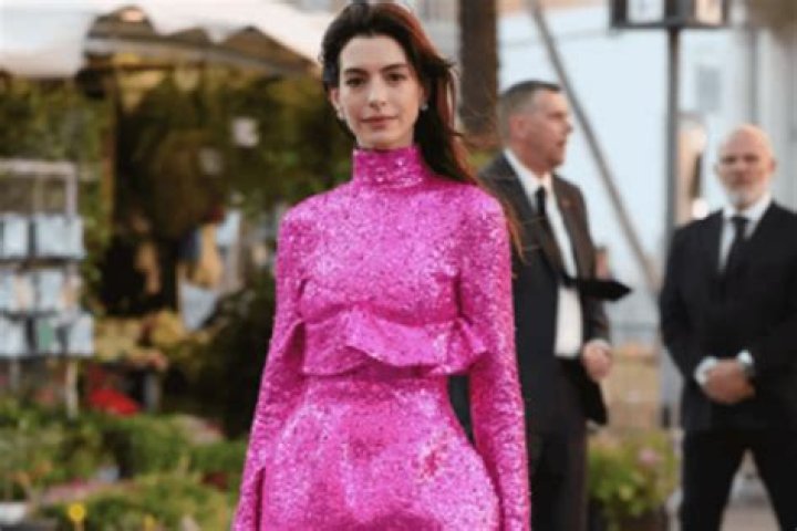 Anne Hathaway Takes Barbie Style To New Heights In a Sparkling Pink Mini Dress