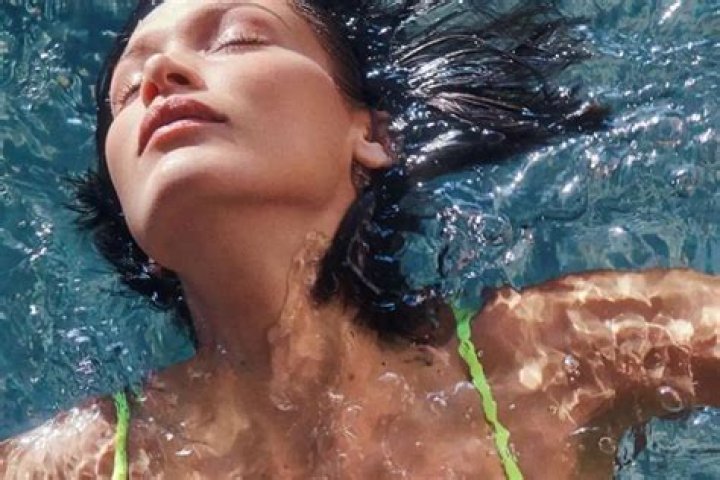 Bella Hadid Flaunts Her Figure In Pale Yellow Underwire Crop Top