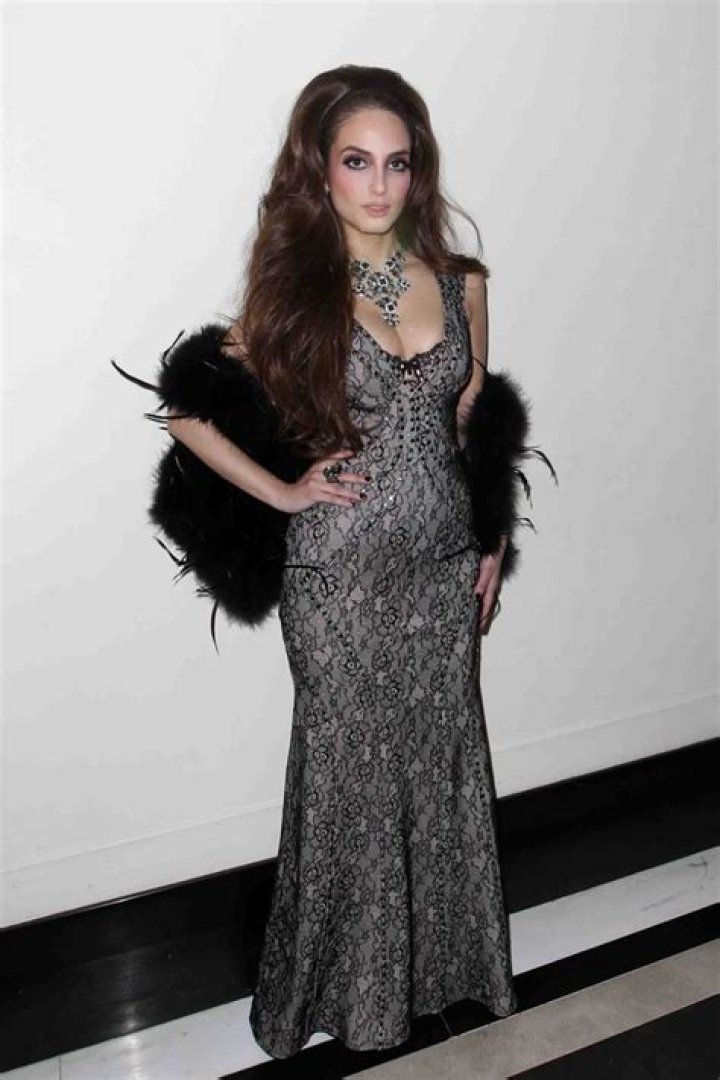 Cynthia Bailey Shows Off Her Curves By Her Lake House – Check Out Her Fire Outfit In These Photos