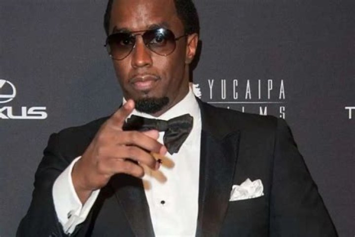 Diddy Is Spotted Kissing An Australian Model At The Beach – See The Photos!