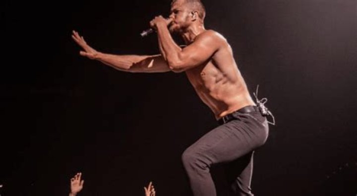 Following The Postponement Of Multiple Tour Dates, Imagine Dragon Frontman Dan Reynolds Provided A Shirtless Health Update