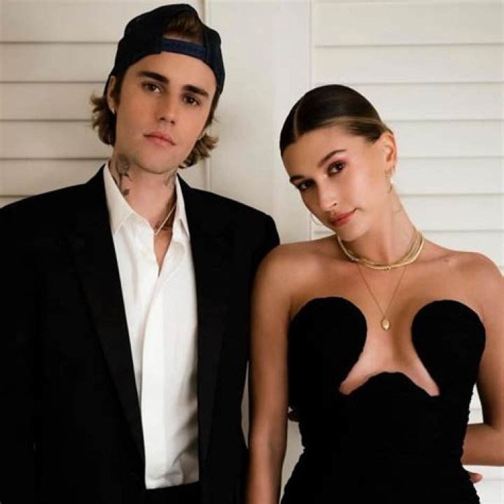 Hailey Bieber Flaunts Her Figure In Plunging Mini Dress As She Rings In The New Year With Justin Bieber