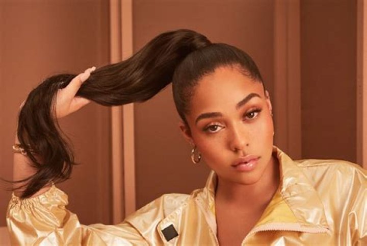 Jordyn Woods Wears An Elegant Skin-Tight Black Dress For The Premiere Of Her Movie