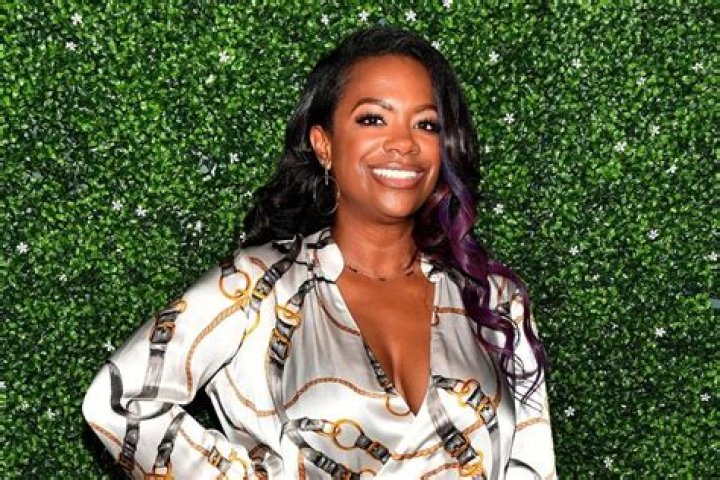 Kandi Burruss Flaunts Massive Cleavage In Her Latest Video