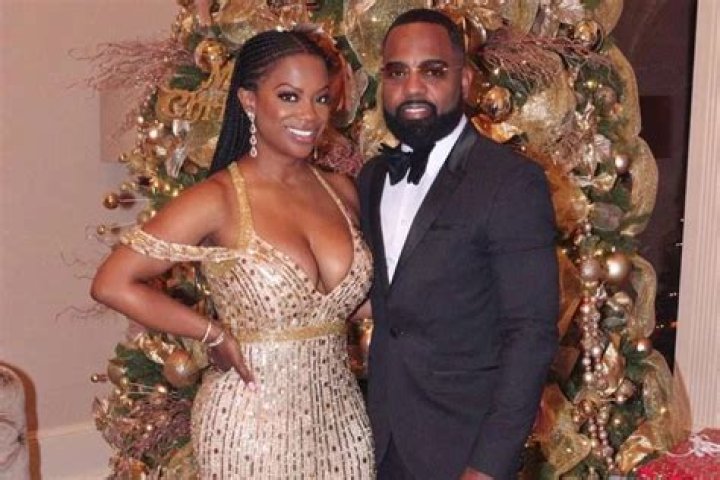 Kandi Burruss Shows Off Massive Cleavage In A Photo With Todd Tucker