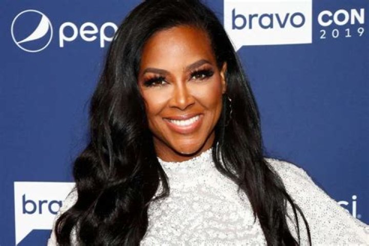 Kenya Moore Looks Sizzling In Pink: ‘Booked And Busy’