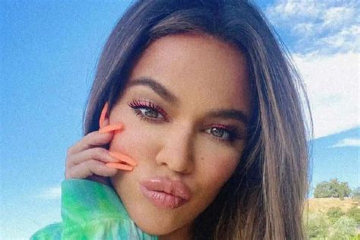 Khloe Kardashian And True Thompson Twin In Burberry Bathing Suits — Is She Hiding A Baby Bump?