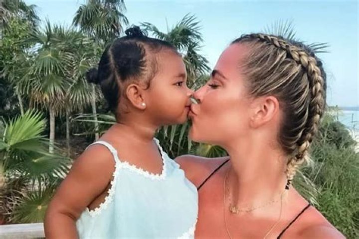 Khloe Kardashian Sweetly Kisses True As Tristan Thompson Leaves A Comment