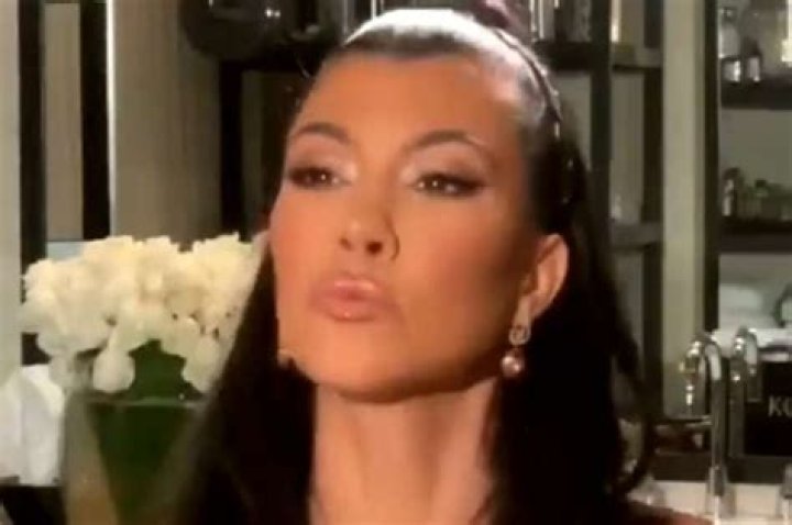 Kourtney Kardashian Admires Herself Dressed In Head-To-Toe Gucci