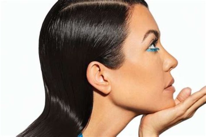 Kourtney Kardashian Shares Sexy Photos In Silk Bathrobe, Kim Pokes Fun At Her Sis