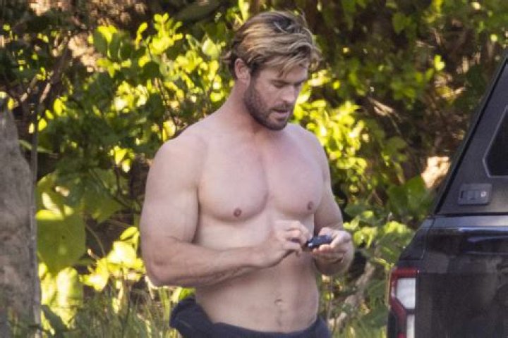 Liam Hemsworth Heads Out To Surf With His Brother Amid Miley Breakup – Sources Say He’s Taking Time To Relax