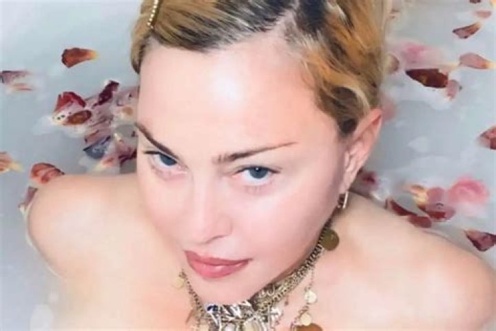 Madonna Muses On Coronavirus ‘The Great Equalizer’ While Taking A Rose Petal Bath