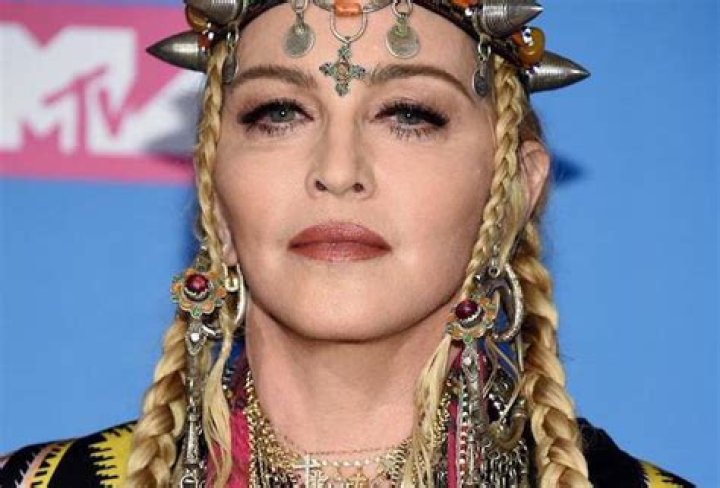 Madonna Sports Shorter, Brunette Hair Amidst Booty-Implants Rumors