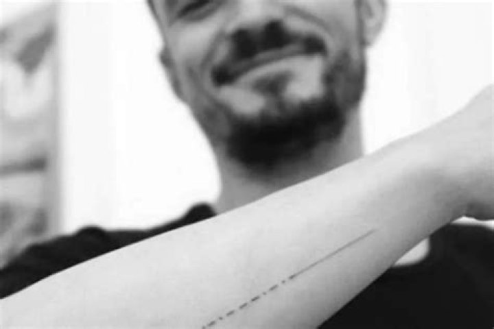 Orlando Bloom Fixes His New Morse Code Tattoo So His Son’s Name Is Spelled Correctly – ‘Finally Dot It Right’