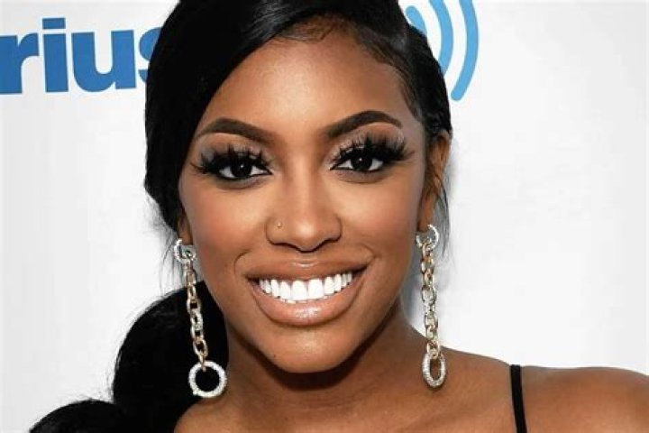 Porsha Williams’ Latest Photos In A Flowy White Dress Have Fans In Awe