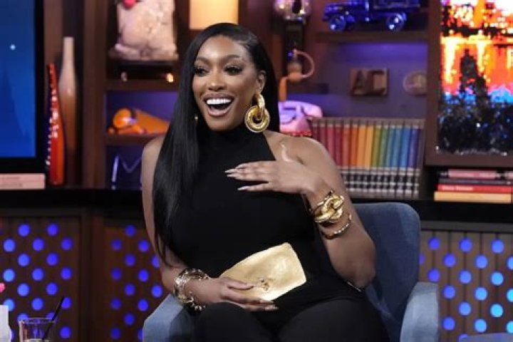 Porsha Williams Looks Divine In This Jaw-Dropping Outfit By Dennis McKinley’s Side