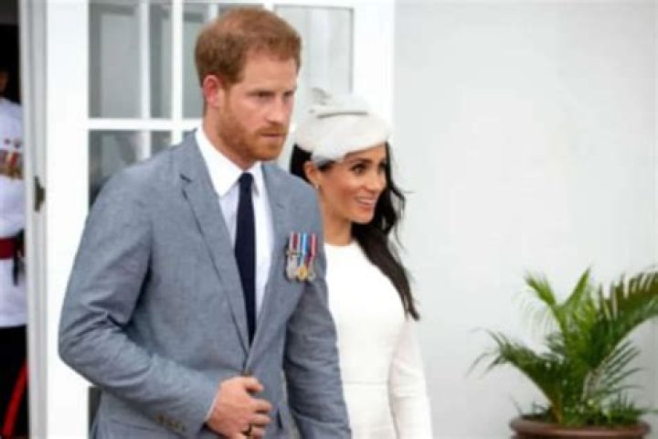 Prince Harry & Meghan Markle Close Buckingham Palace Office & Fire Royal Staff
