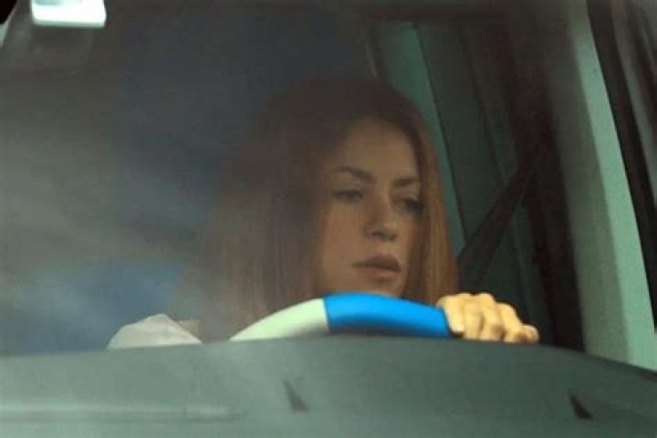 Shakira looks downcast after photos of her husband surfaced in the media