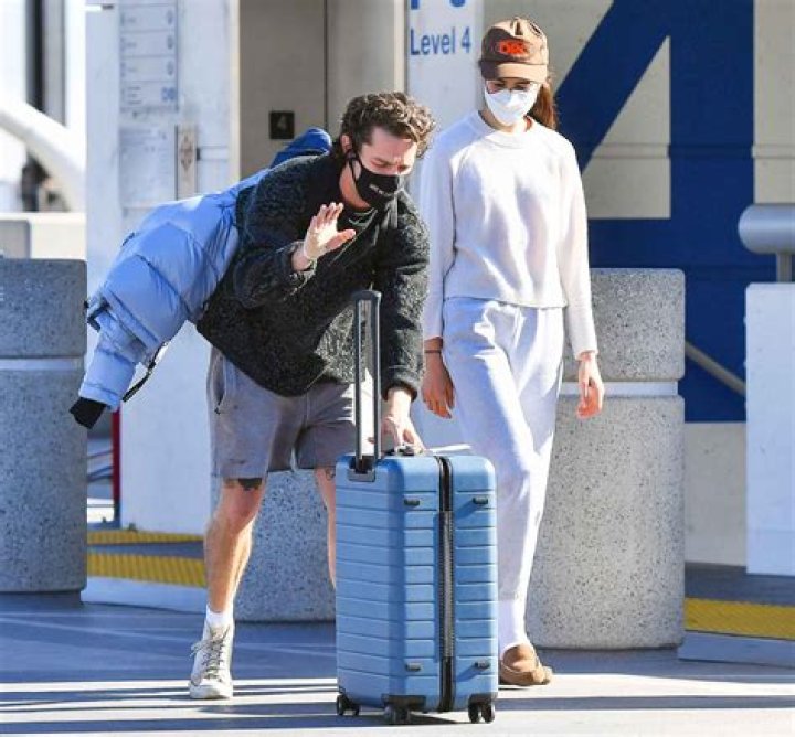 Shia LaBeouf And Margaret Qualley Spotted Kissing AT LA Airport
