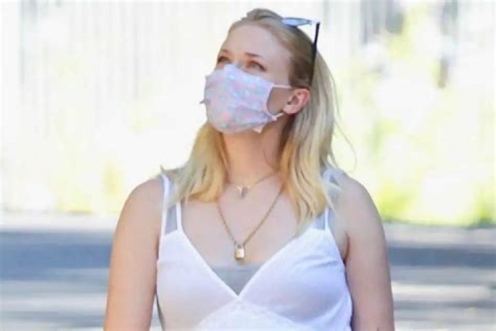 Sophie Turner Looks Angelic In White Dress During A Walk With Joe Jonas – Check Out Her Growing Baby Bump!