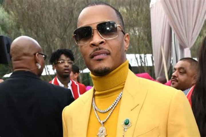 T.I. Receives Backlash From Fans After Posting This Photo: ‘What Kind Of Vibe Is This For A Married Man?’