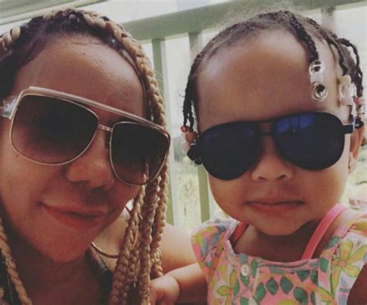 Tiny Harris And T.I. Bond With Baby Heiress In Adorable Holiday Video – See How!