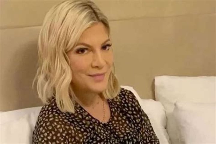 Tori Spelling Claps Back At Haters Who Claim She Used Her Kids To Make Money With Holiday Pics
