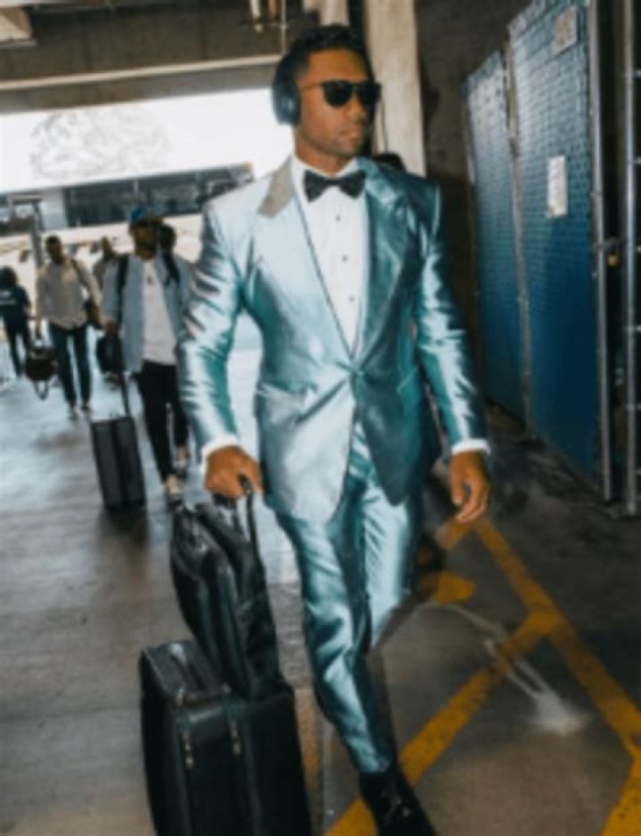 When Russell Wilson Wears This Metallic Suit, Fans Can’t Look Away